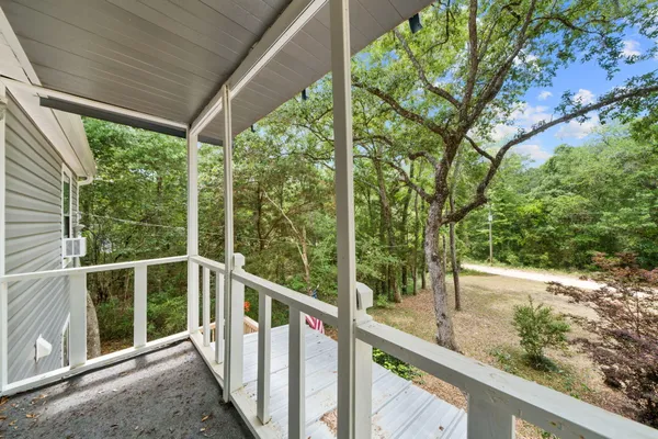 a view of a porch with a yard