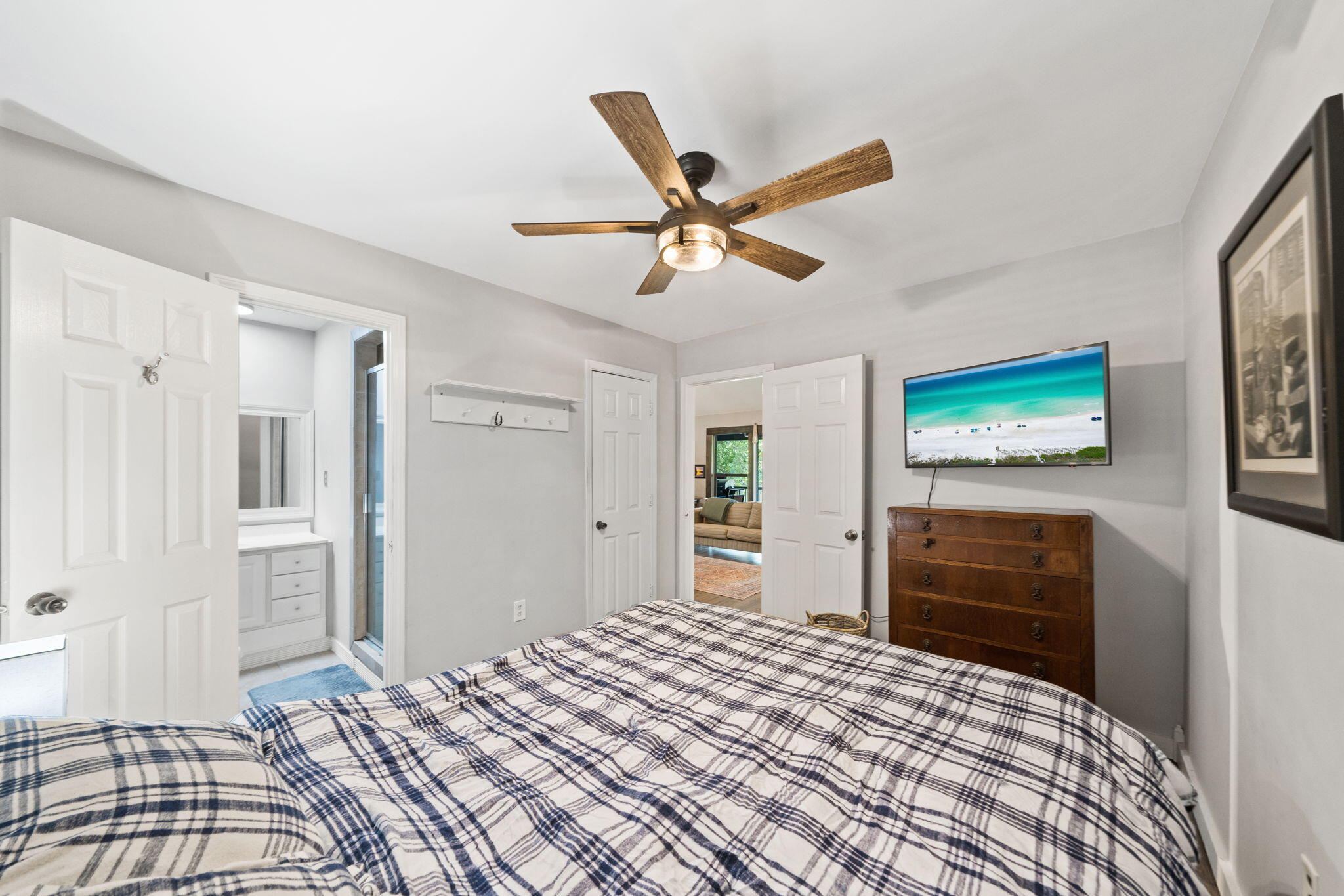 439 Big Cedar Road Ponce de Leon, FL 32455 - Photo 21 of 48 a bedroom with a bed and a television