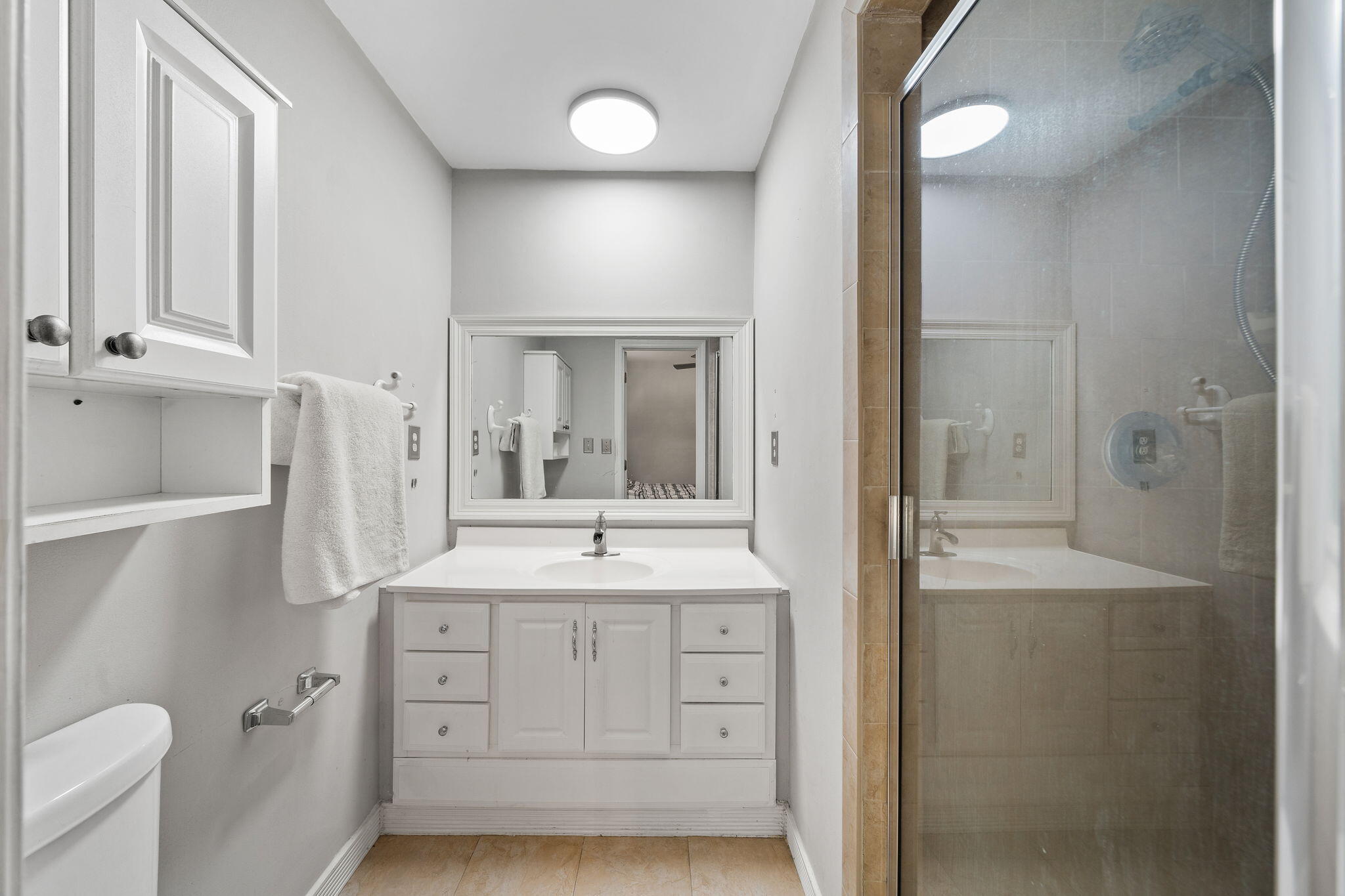 439 Big Cedar Road Ponce de Leon, FL 32455 - Photo 22 of 48 a bathroom with a sink a toilet and shower