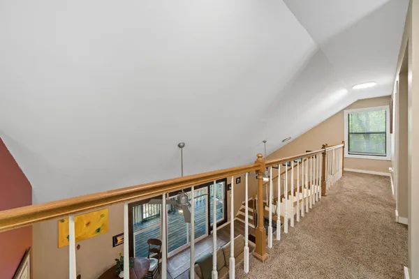 a view of an entryway with wooden floor