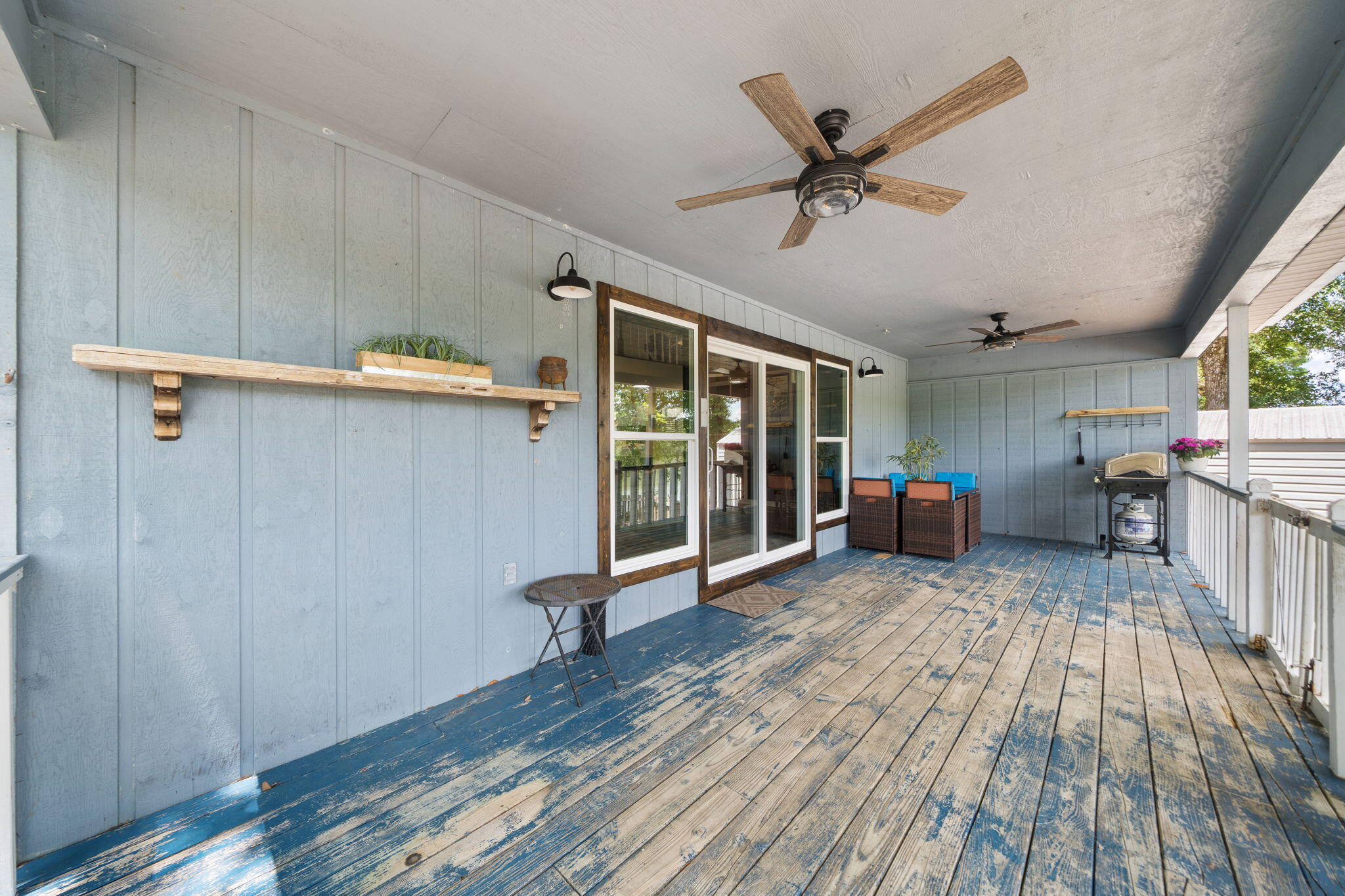 439 Big Cedar Road Ponce de Leon, FL 32455 - Photo 37 of 48 a view of a livingroom with furniture and a ceiling fan