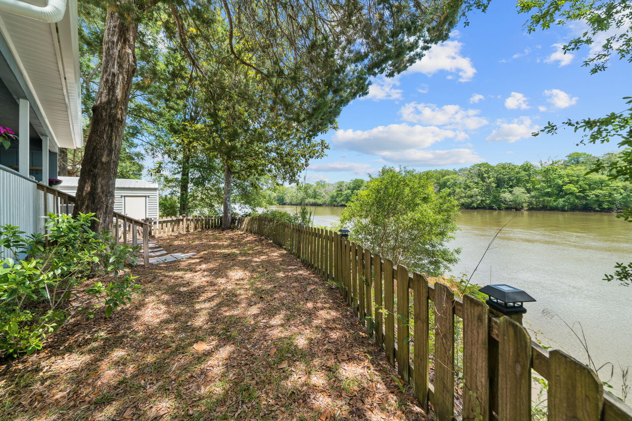 439 Big Cedar Road Ponce de Leon, FL 32455 - Photo 41 of 48 a view of a pathway with a wrought fence