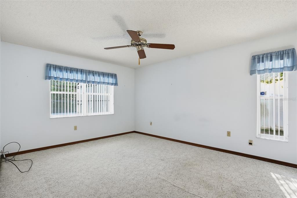 2414 Appian Avenue Spring Hill, FL 34608 - Photo 12 of 37 a view of an empty room with a window