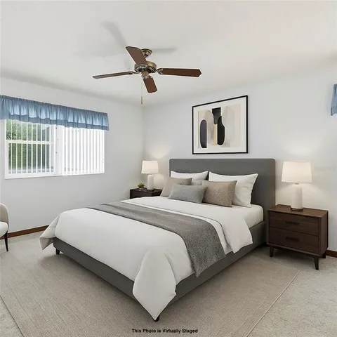 a bedroom with a bed and window