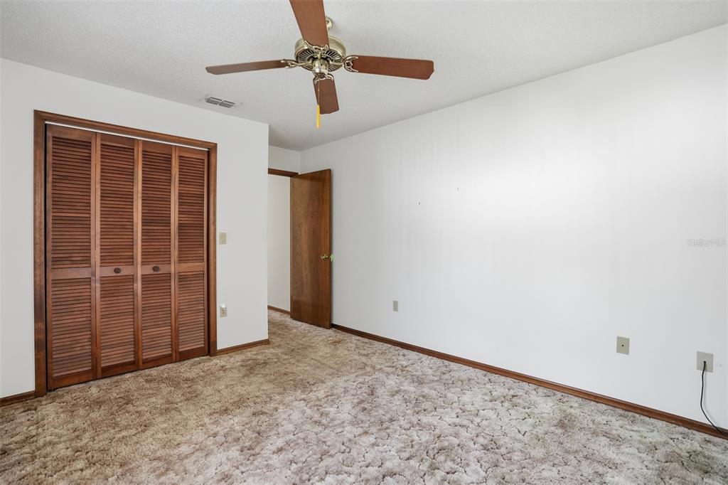 2414 Appian Avenue Spring Hill, FL 34608 - Photo 16 of 37 an empty room with windows