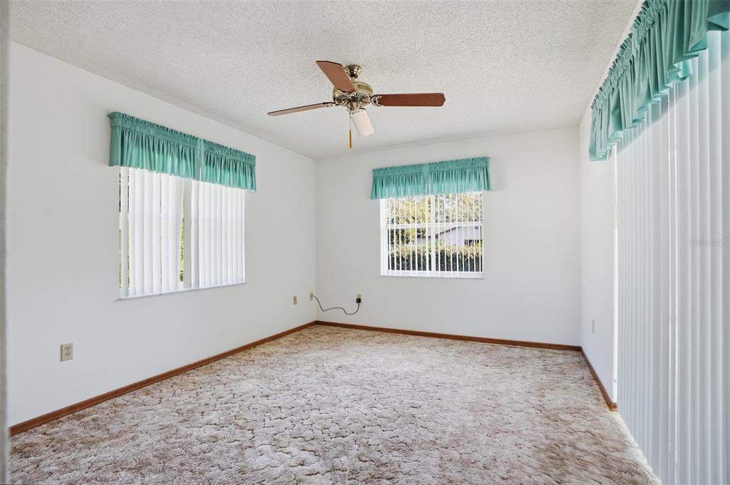 2414 Appian Avenue Spring Hill, FL 34608 - Photo 17 of 37 a view of an empty room with a window