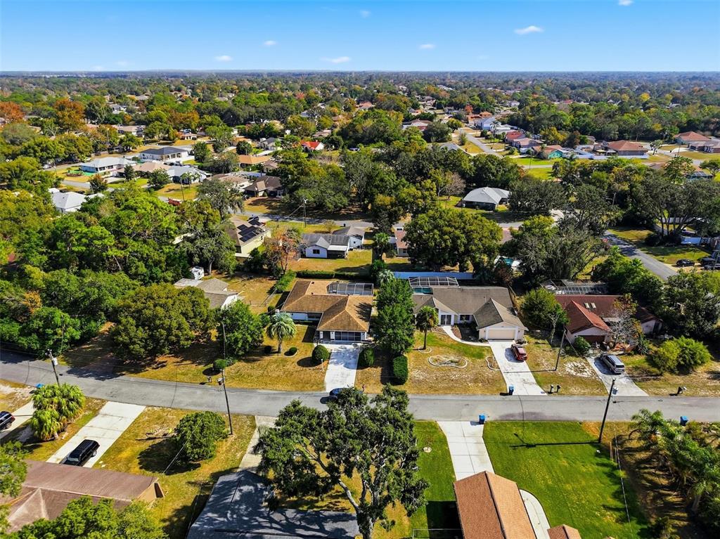 2414 Appian Avenue Spring Hill, FL 34608 - Photo 30 of 37 an aerial view of residential houses with outdoor space