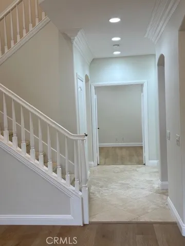 a view of house with a yard