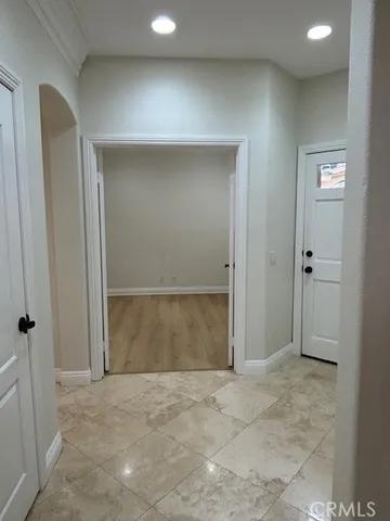 an empty room with closet area