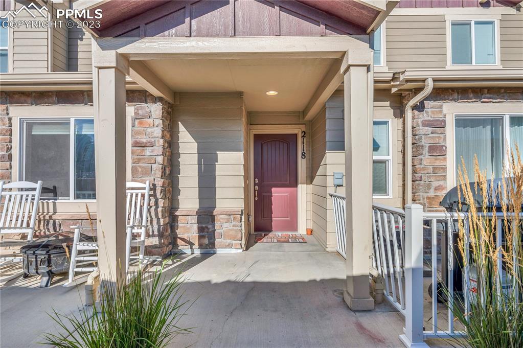 a front view of a house with a porch