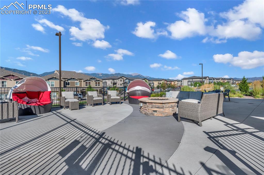 2118 Birmingham Loop Colorado Springs, CO 80910 - Photo 26 of 28 a view of a terrace with sitting area
