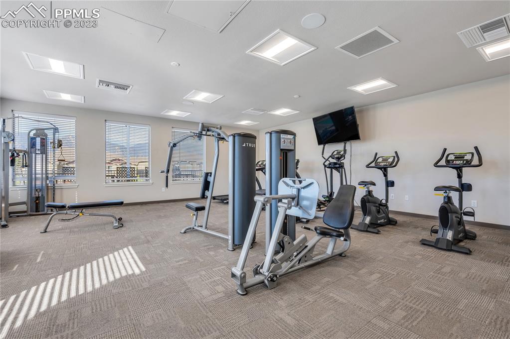 2118 Birmingham Loop Colorado Springs, CO 80910 - Photo 28 of 28 a view of a room with gym equipment
