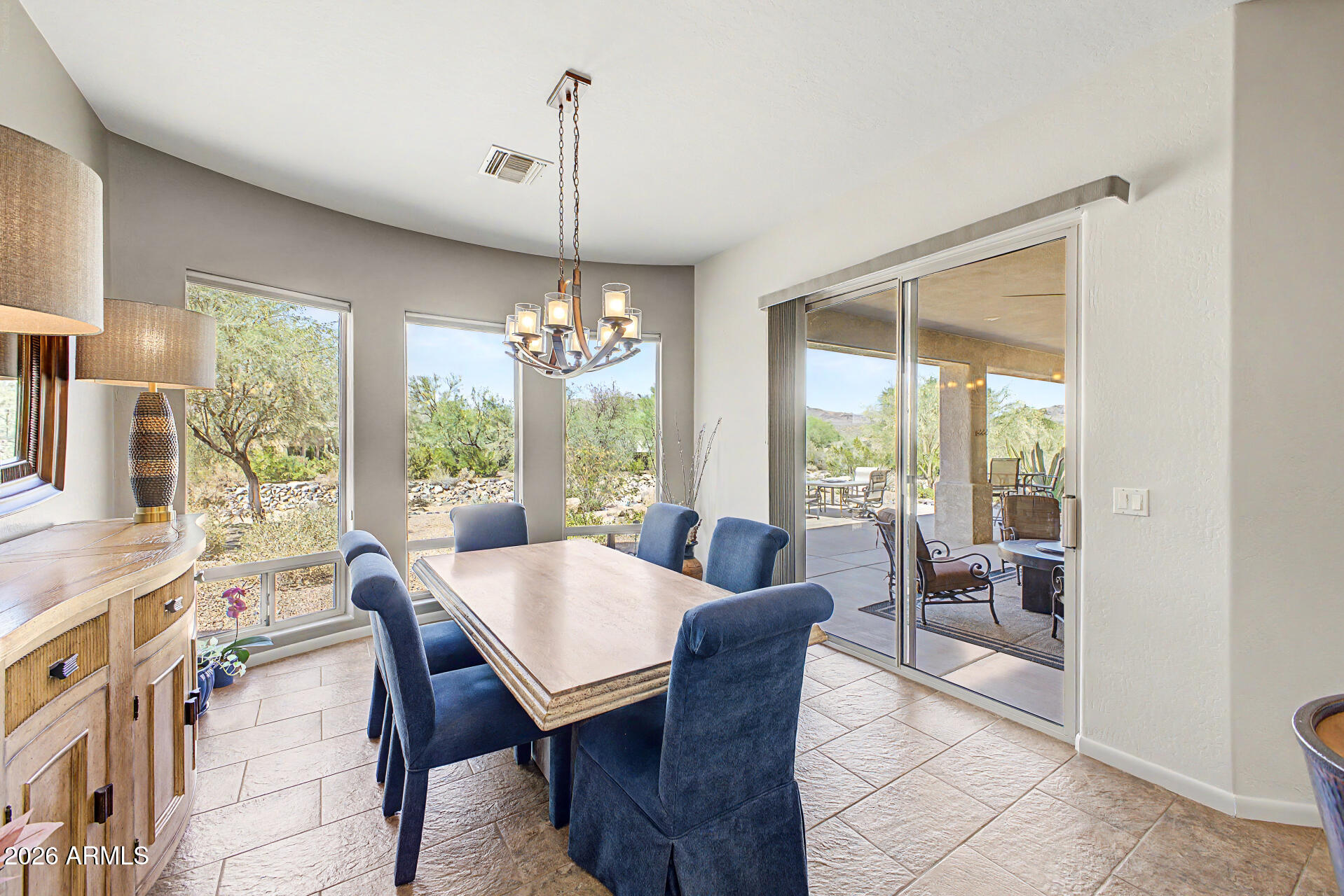 27909 North Quail Spring Road Rio Verde, AZ 85263 - Photo 10 of 52 a view of a dining room with furniture window and outside view