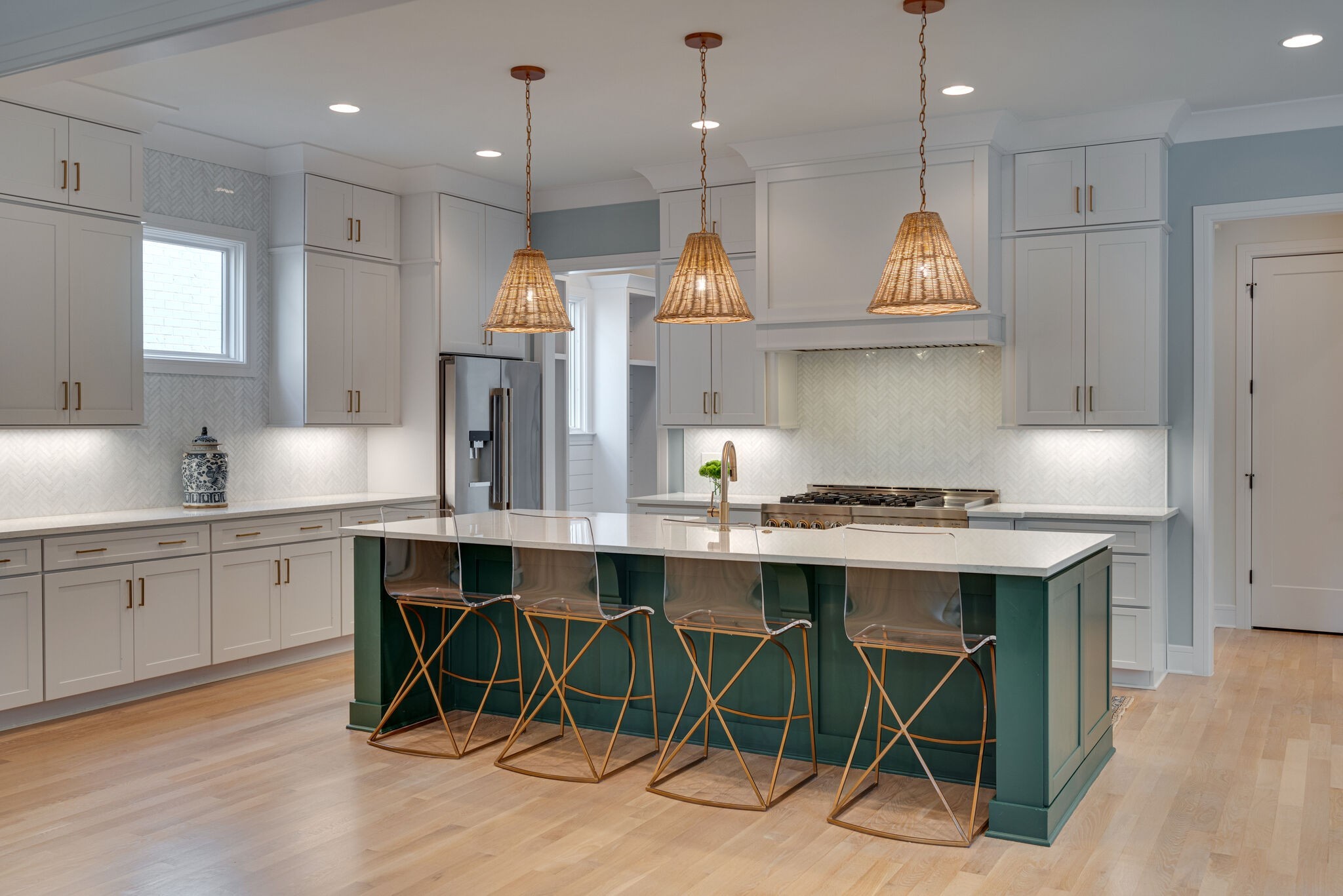 3503 Robin Road Nashville, TN 37204 - Photo 24 of 56 a kitchen with stainless steel appliances granite countertop a table chairs sink and stove top oven