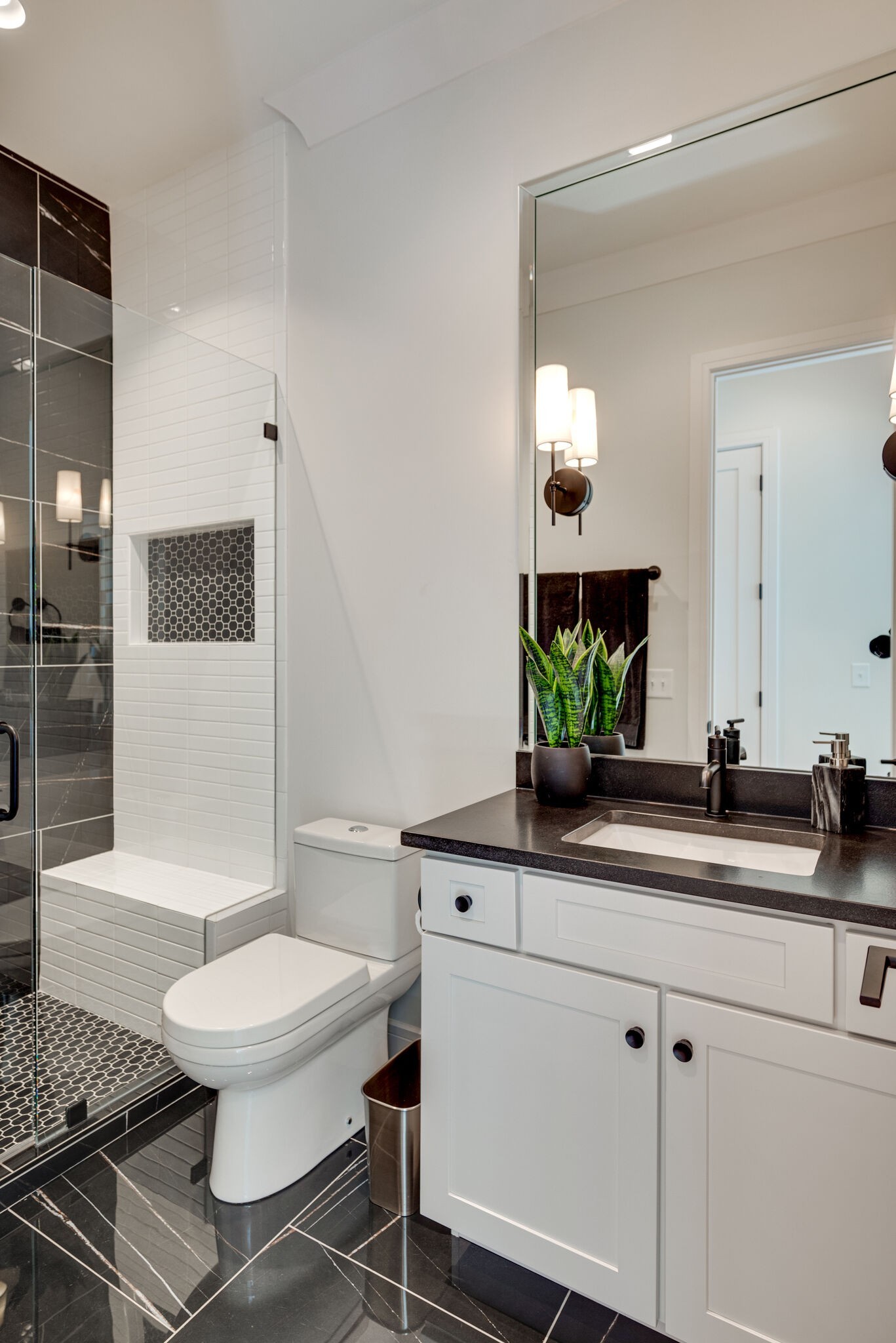 3503 Robin Road Nashville, TN 37204 - Photo 28 of 56 a bathroom with a toilet a sink and mirror