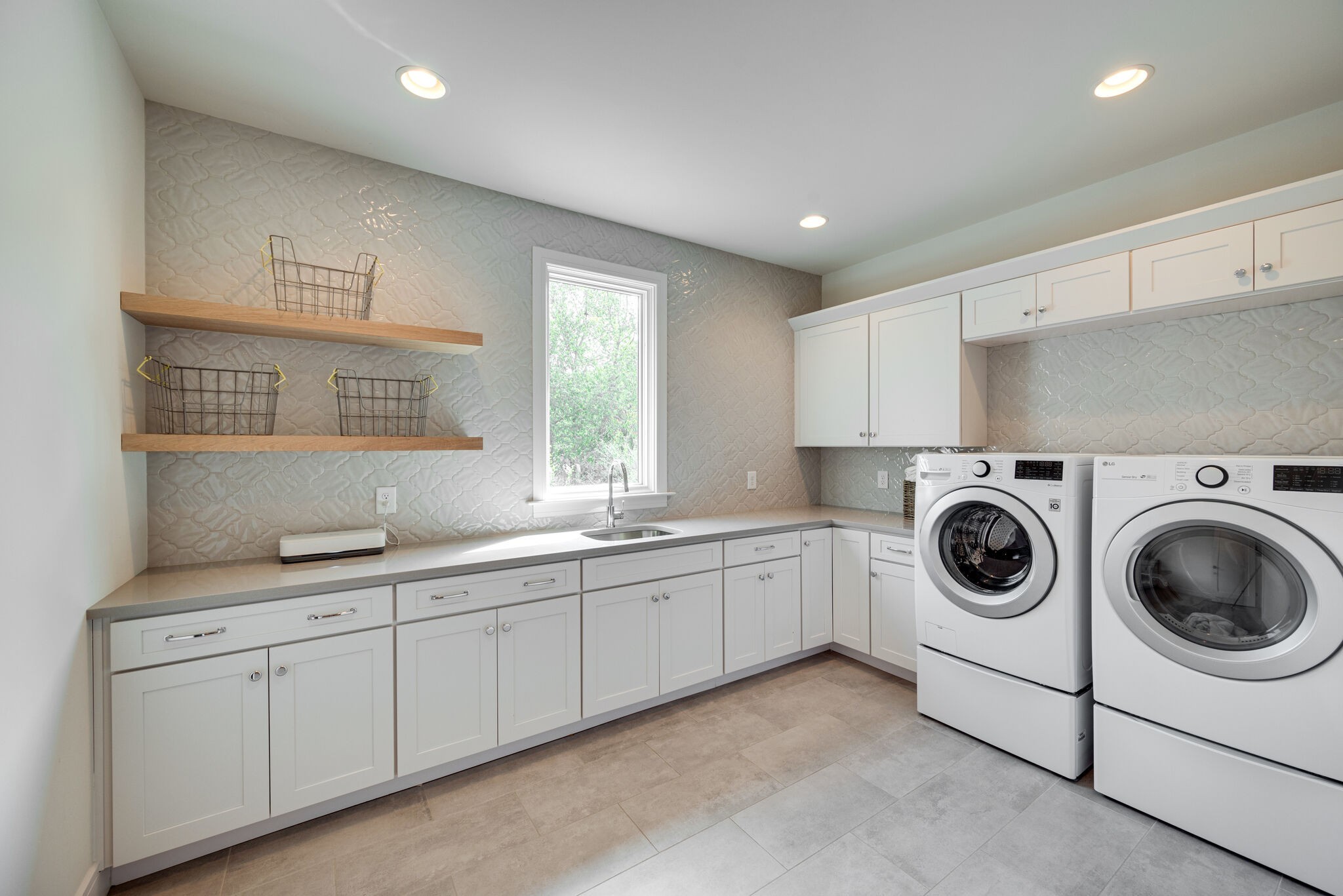 3503 Robin Road Nashville, TN 37204 - Photo 37 of 56 a utility room with sink dryer and washer