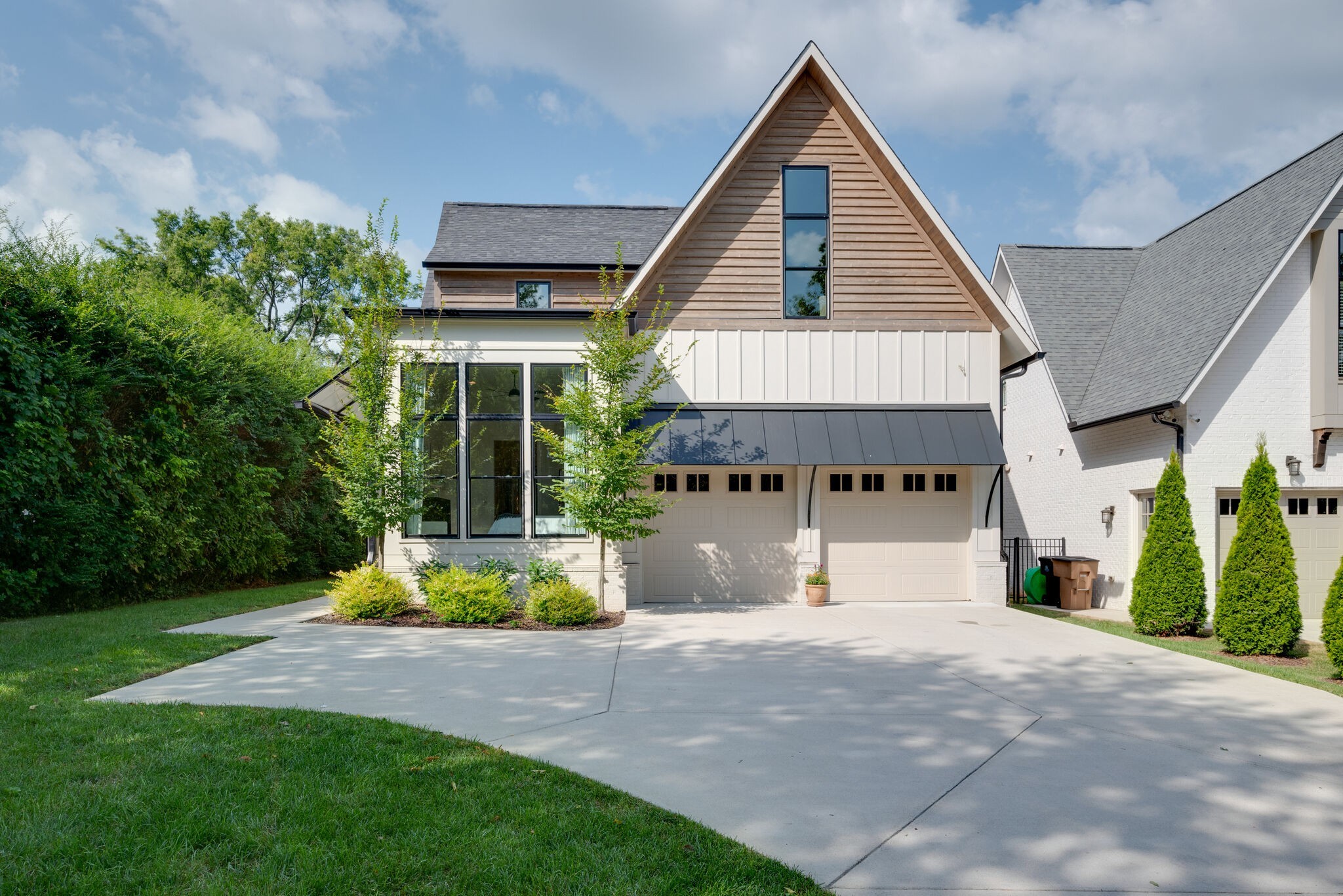 3503 Robin Road Nashville, TN 37204 - Photo 4 of 56 a front view of a house with a yard