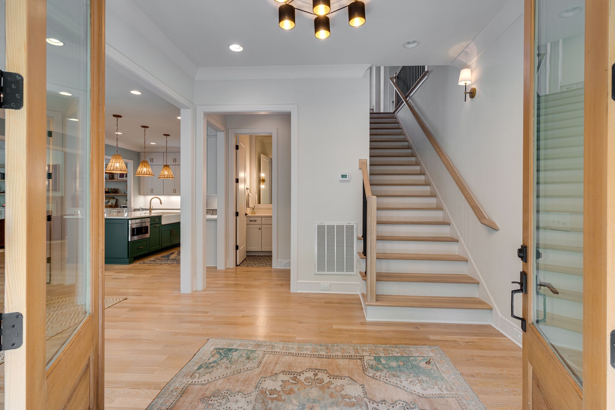 3503 Robin Road Nashville, TN 37204 - Photo 7 of 56 a view of a hallway view with wooden floor and staircase