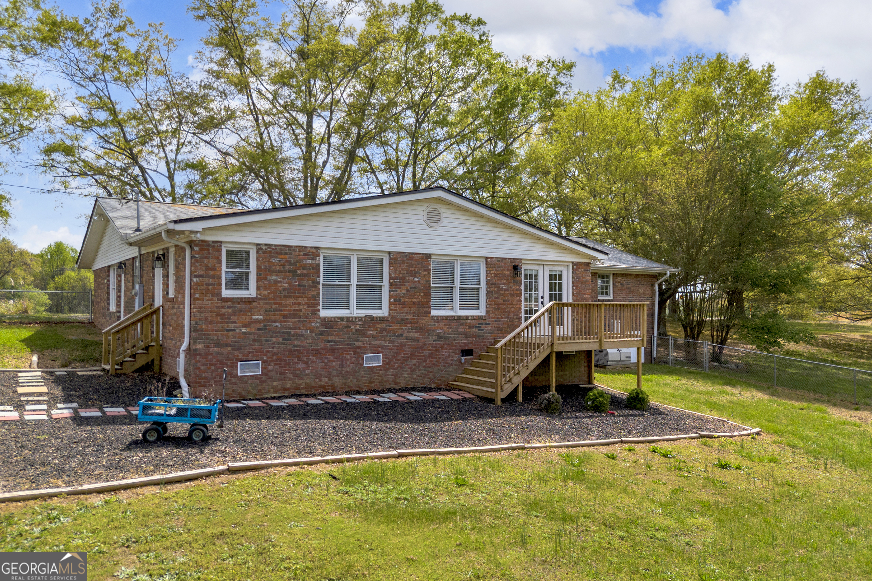 450 Clarks Creek Road North Martin, GA 30557 - Photo 11 of 70 a front view of a house with a yard