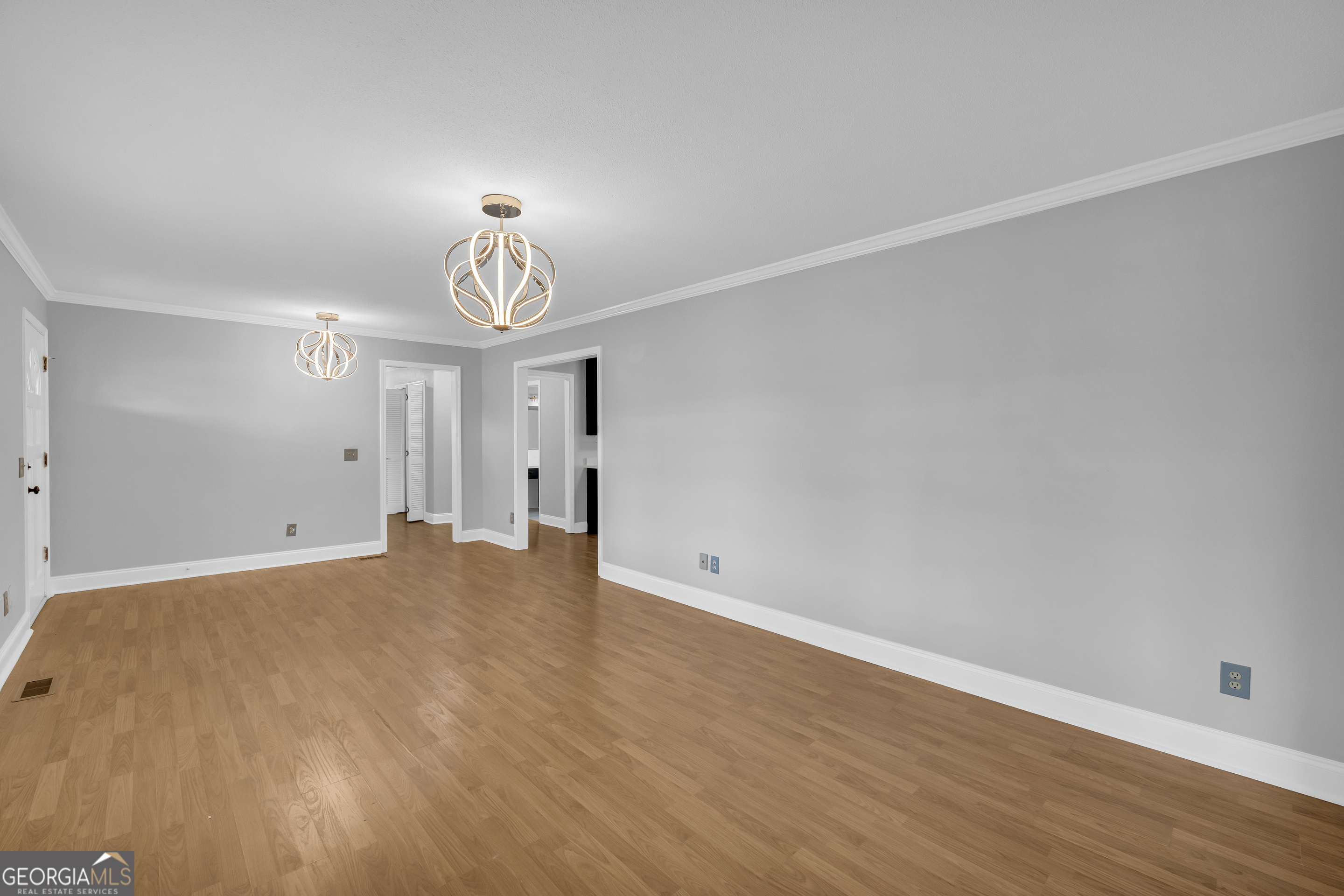 450 Clarks Creek Road North Martin, GA 30557 - Photo 24 of 70 a view of empty room with wooden floor and ceiling fan
