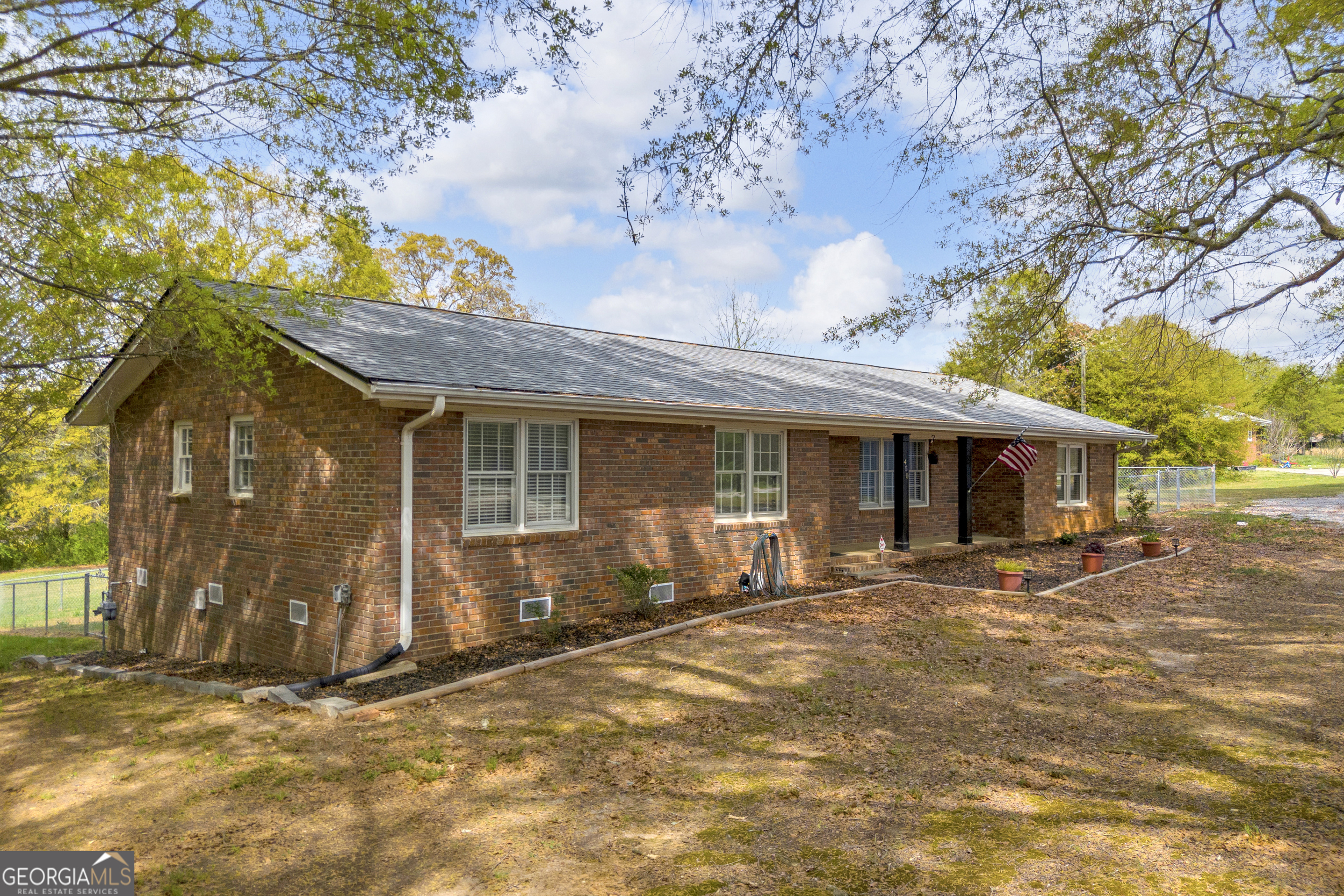 450 Clarks Creek Road North Martin, GA 30557 - Photo 3 of 70 a front view of a house with a garden