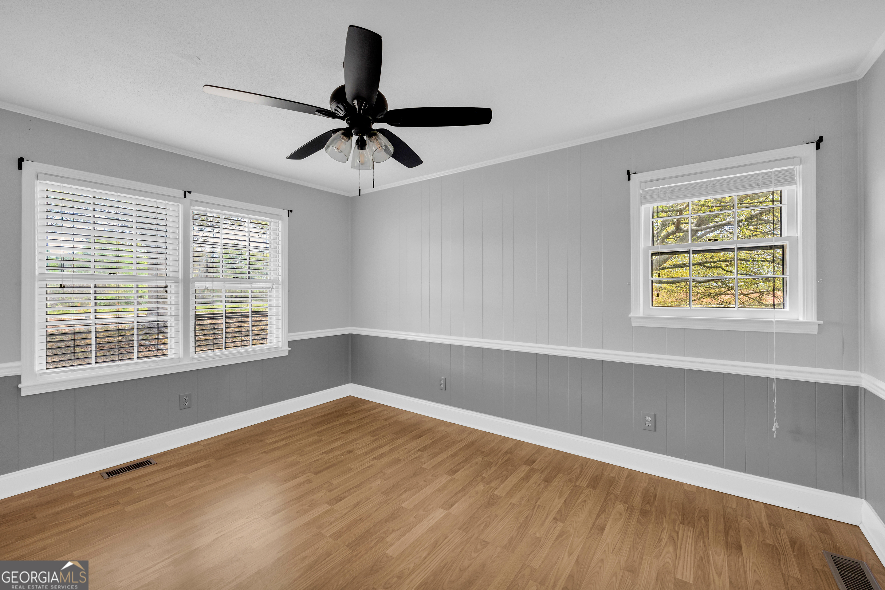 450 Clarks Creek Road North Martin, GA 30557 - Photo 37 of 70 a view of an empty room with wooden floor and a window