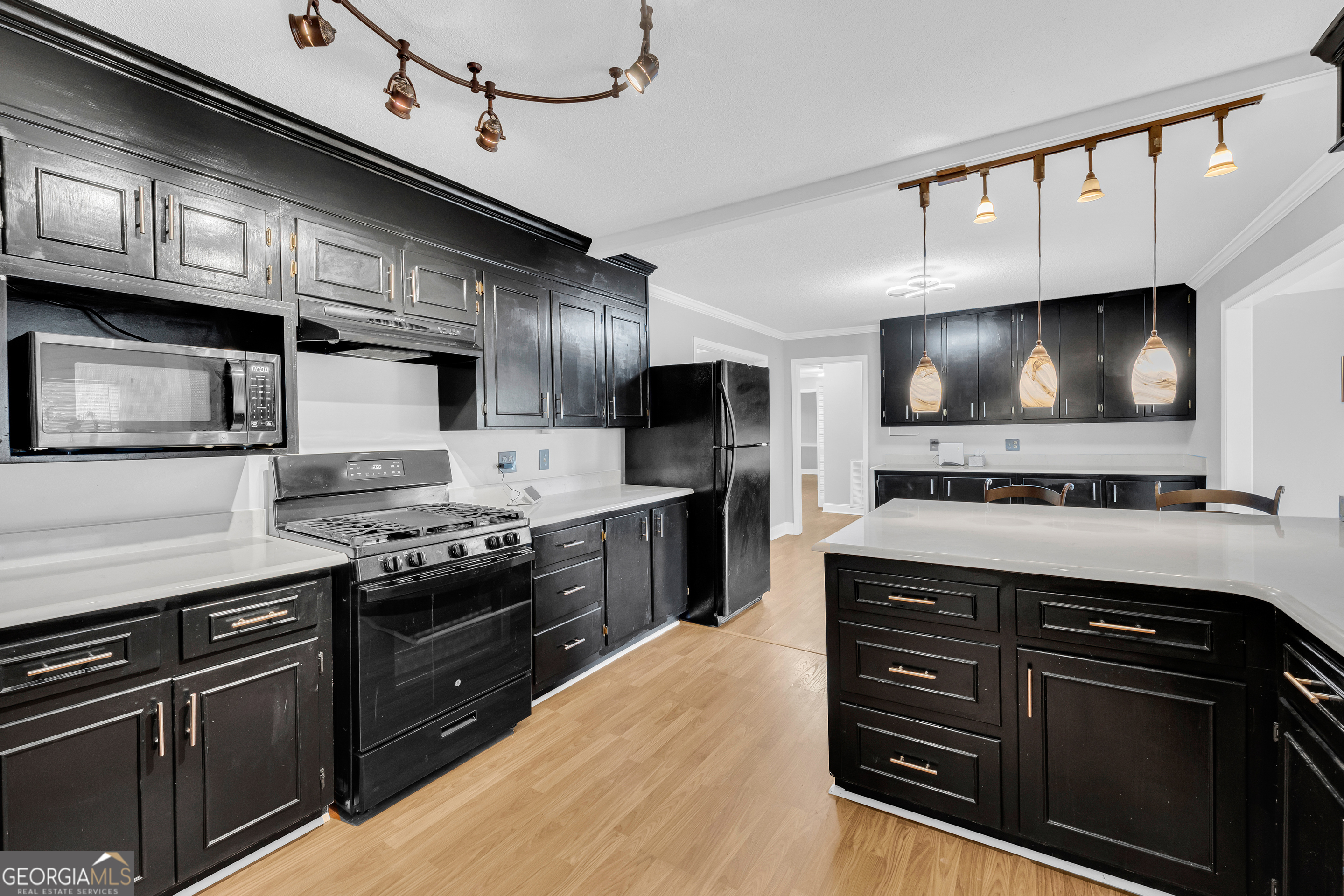 450 Clarks Creek Road North Martin, GA 30557 - Photo 47 of 70 a kitchen with stainless steel appliances and stove top oven