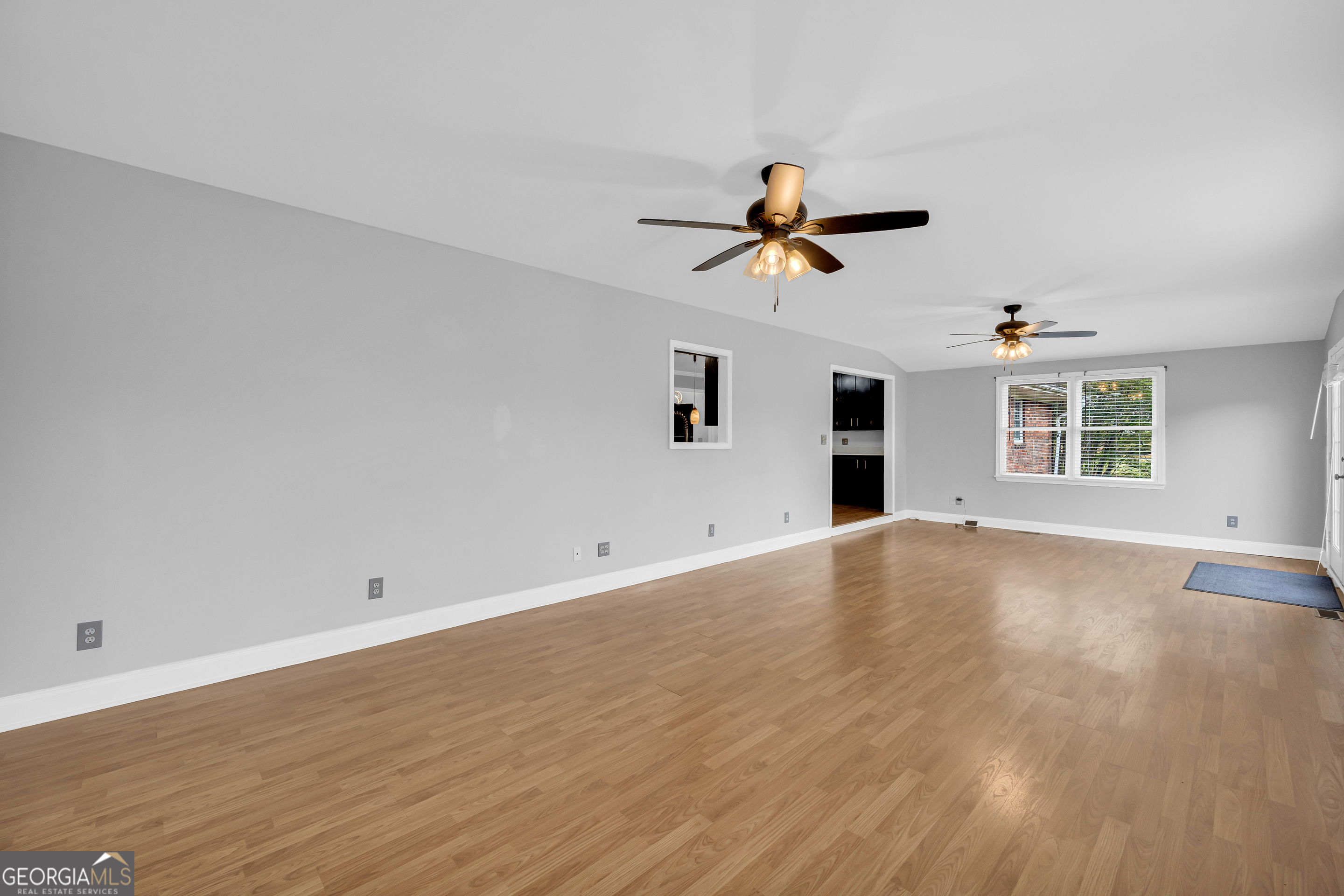 450 Clarks Creek Road North Martin, GA 30557 - Photo 51 of 70 a view of a livingroom with a ceiling fan and window