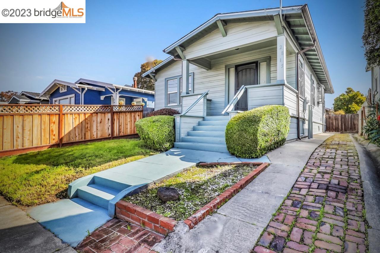 2815 Wallace Street Berkeley, CA 94702 - Photo 1 of 1 a front view of a house with garden