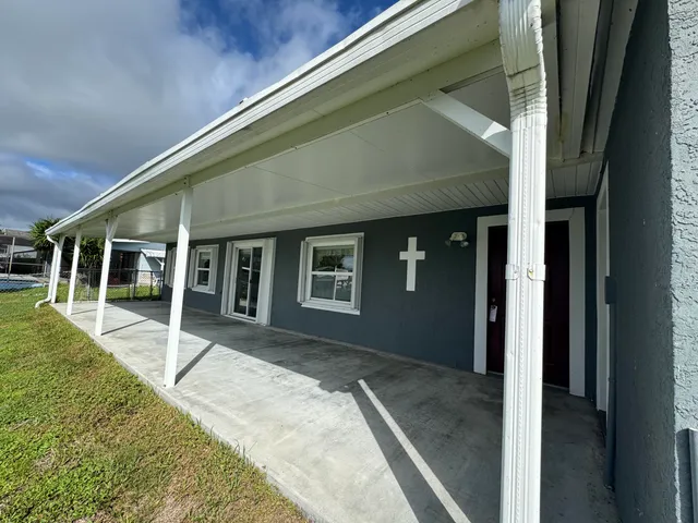 a house view with a garden space