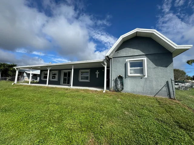 a view of swimming pool with outdoor seating