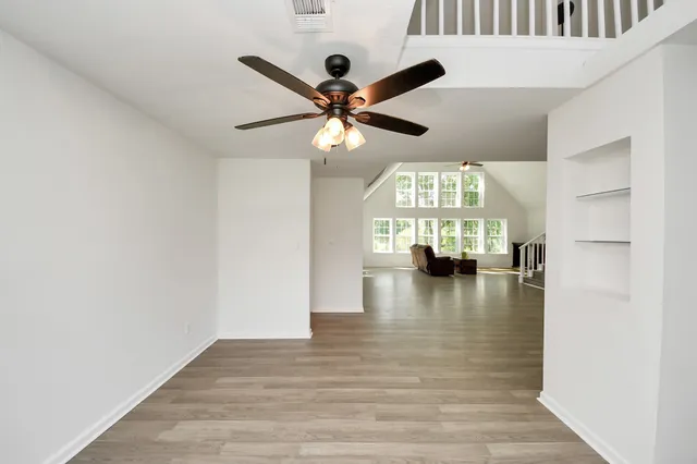 a view of an entryway and livingroom