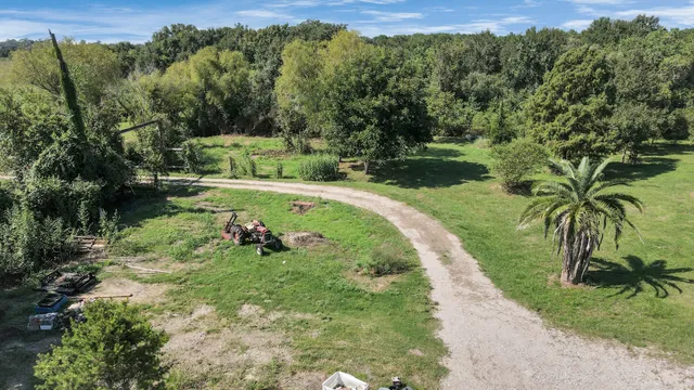 a view of a lake with a yard