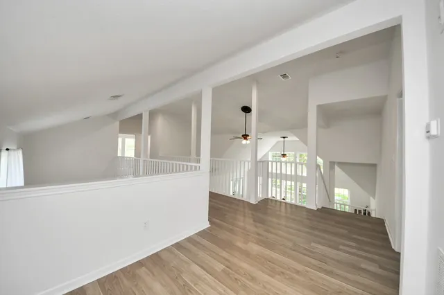 a view of entryway with wooden floor