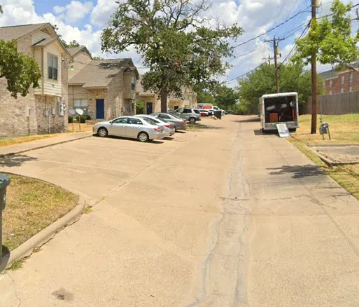 a cars parked on the side of street