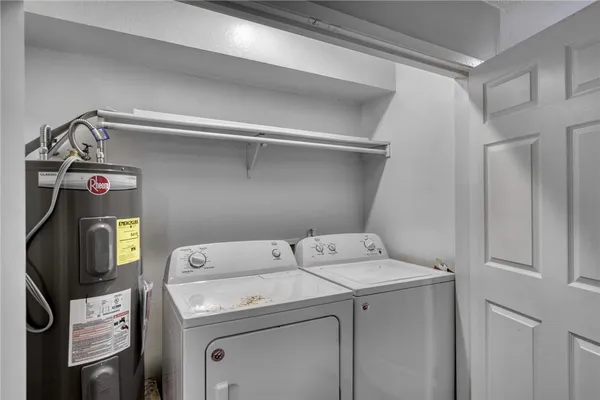 a utility room with dryer and washer