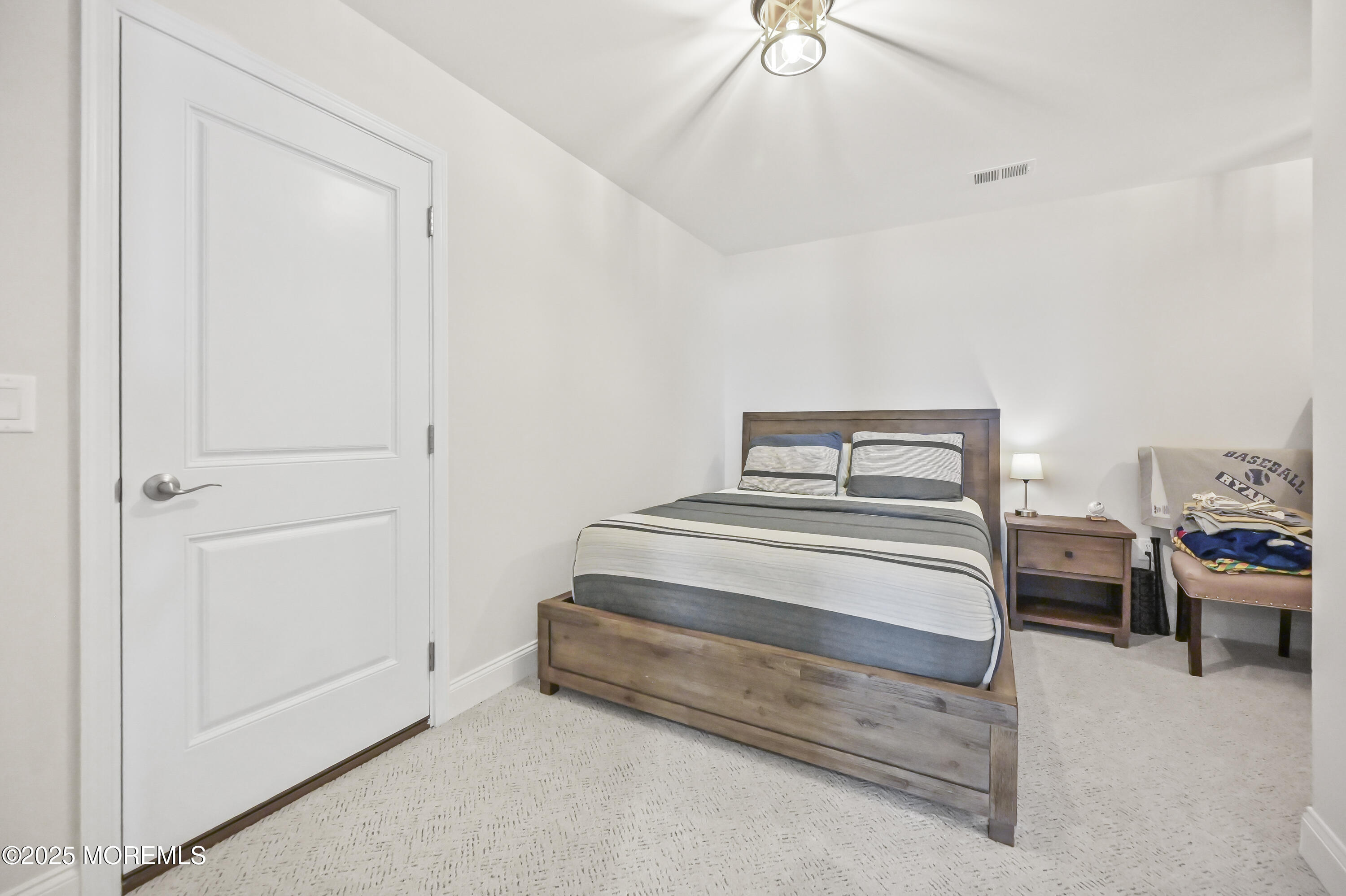 60 Sofia Drive Manalapan, NJ 07726 - Photo 17 of 25 a bedroom with bed and window