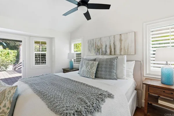 a bathroom with a glass door shower