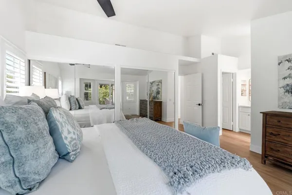 a view of a patio with table and chairs and potted plants