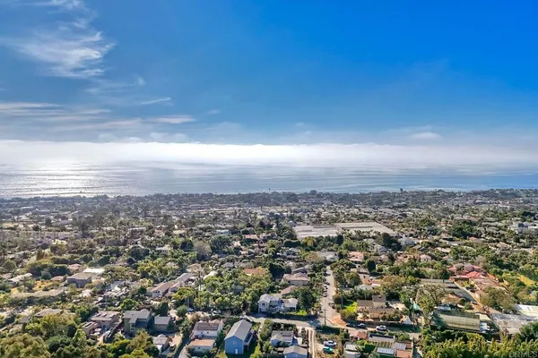 a kitchen with a stove and cabinets