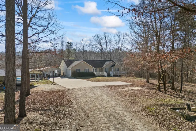a view of lake with green space