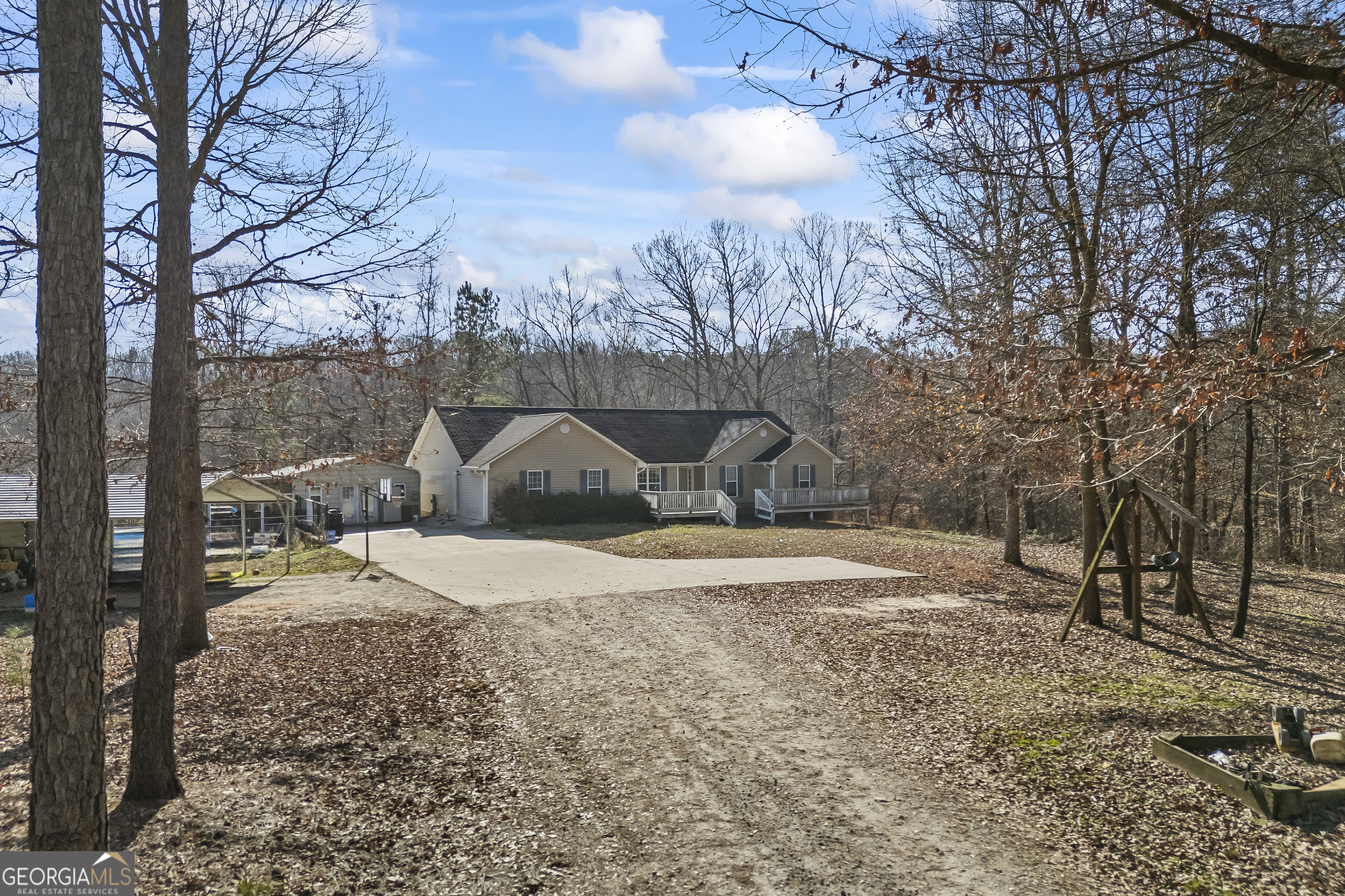 747 Washington Road Lexington, GA 30648 - Photo 26 of 118 a view of a yard with a snow on the road