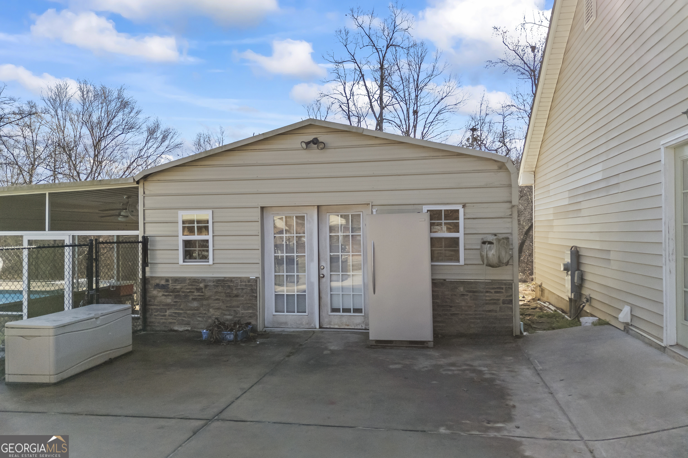 747 Washington Road Lexington, GA 30648 - Photo 28 of 118 a front view of a house with parking space