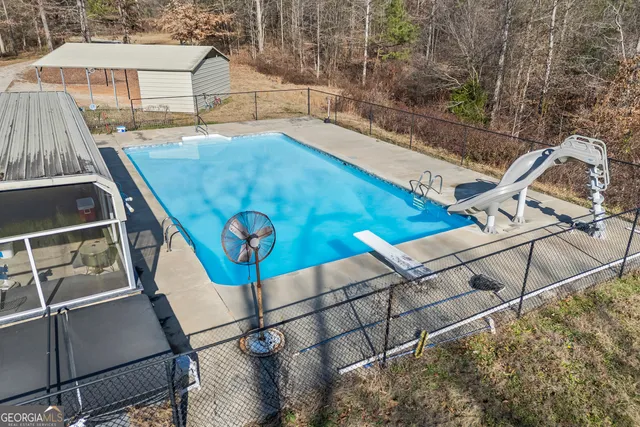 a view of a lake with a building in the background