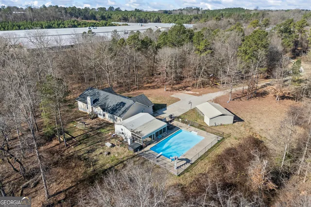 a backyard of a house with lots of green space
