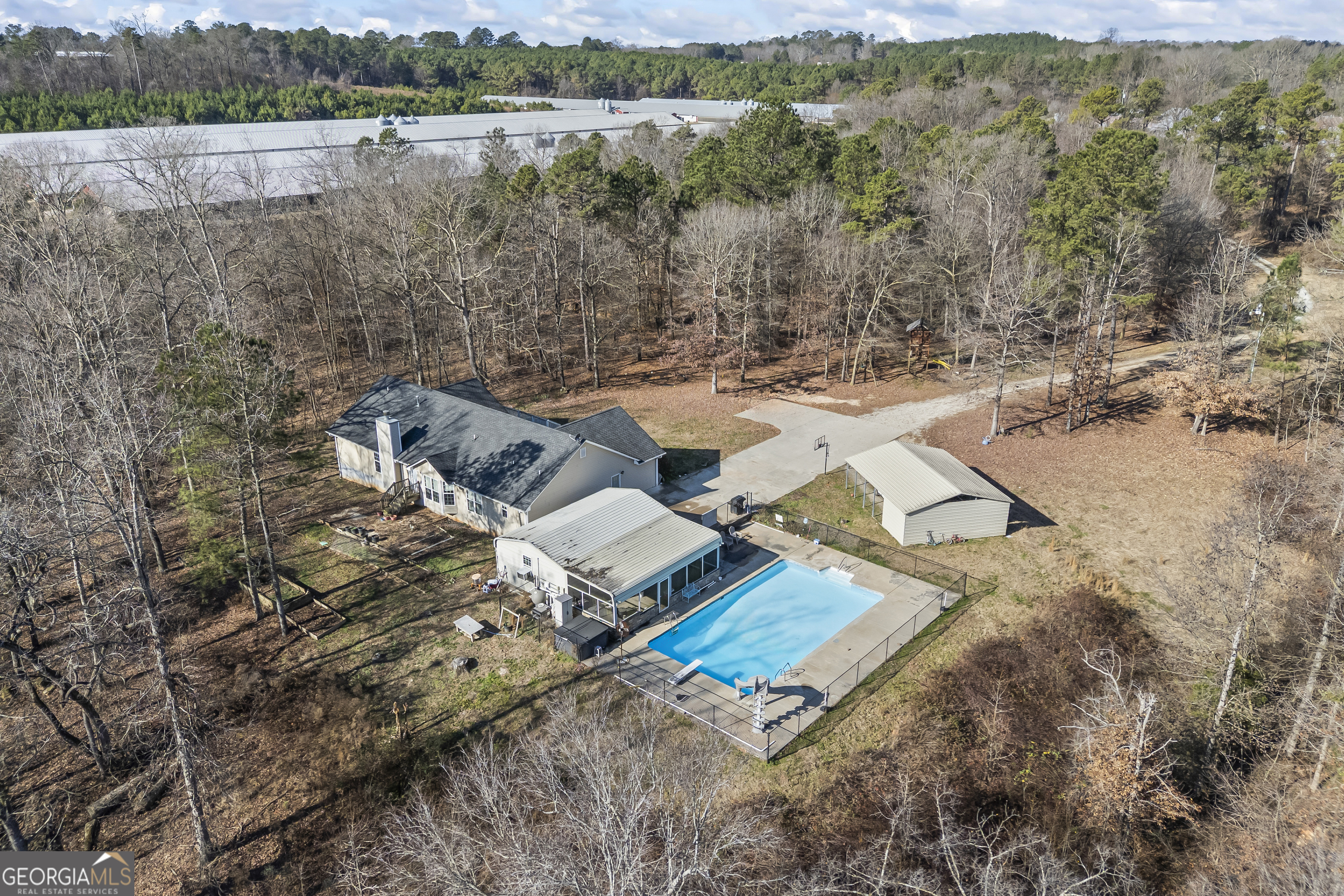 747 Washington Road Lexington, GA 30648 - Photo 31 of 118 an aerial view of a house with a yard