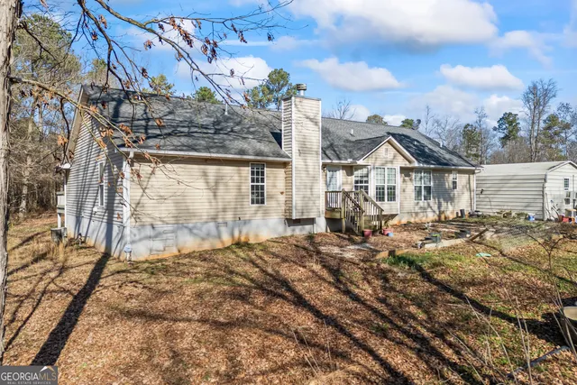 a house view with a outdoor space