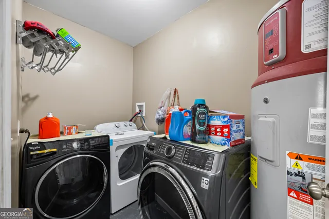 a building outdoor space with patio furniture and garden view