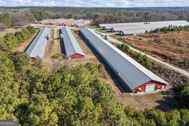 a front view of a house with parking space