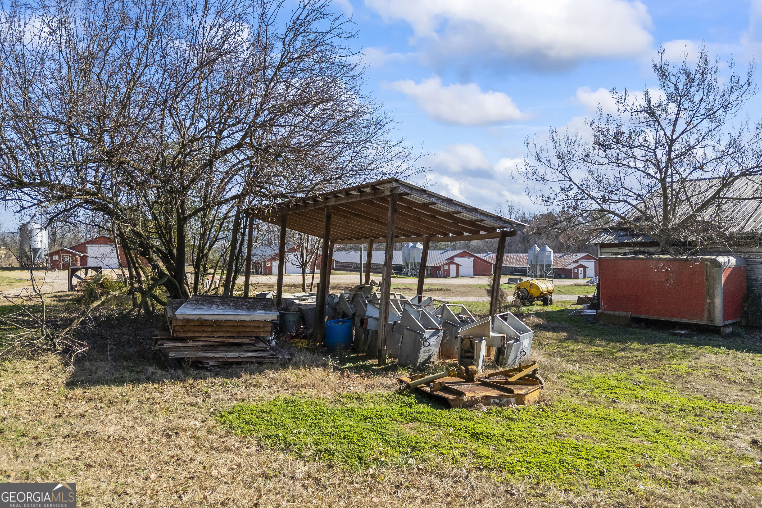 747 Washington Road Lexington, GA 30648 - Photo 62 of 118 a view of a chairs and table in backyard of the house